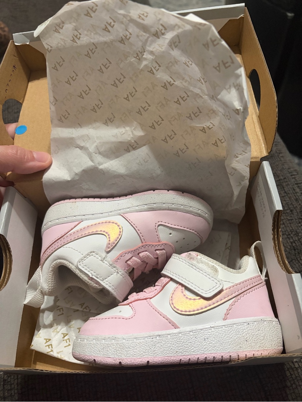 Kids Pink & White Nike Sneakers with Iridescent Swoosh